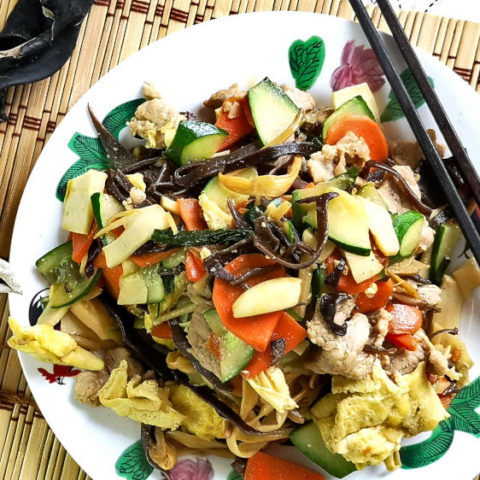Moo Shu Pork (木须肉) is a traditional Northern Chinese cuisine prepared by stir-frying meat slices, mixed vegetables, and eggs. It is easy to cook, to be served with rice or even as the filing of pancakes.