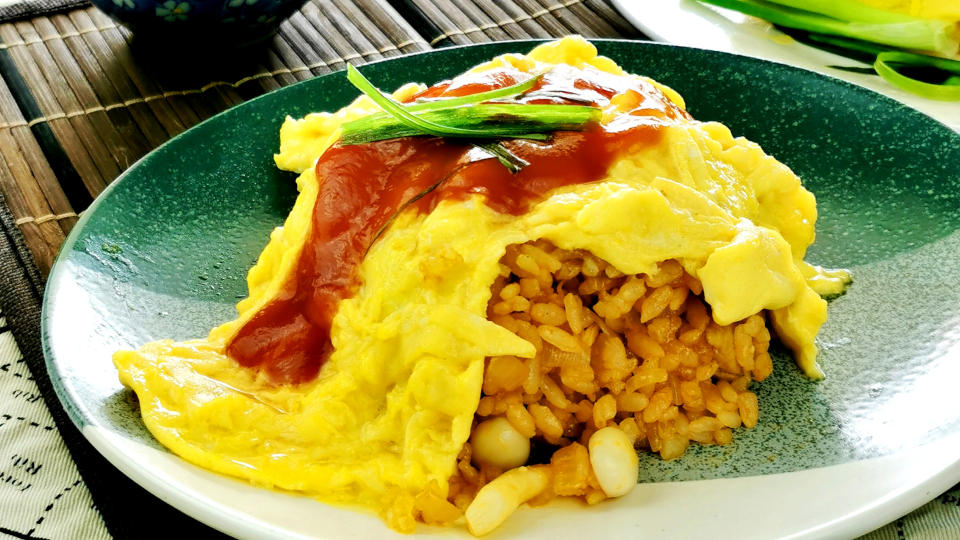 Omurice (オムライス, Omu-raisu) is a Japanese cuisine consisting of ketchup-based fried rice and omelet.