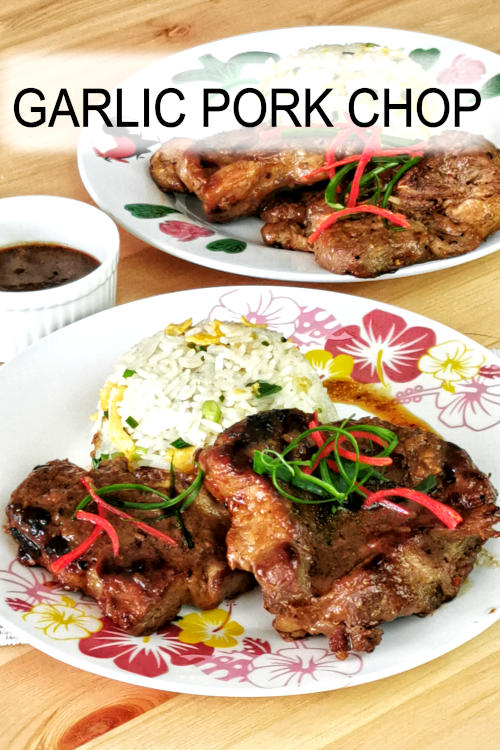 Tasty garlic pork chops with an Asian Twist. The pork is marinated with soy sauce, fish sauce, and black vinegar. Pair with fried rice for a complete meal.