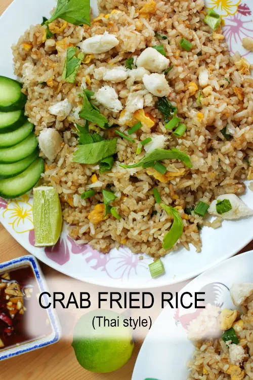 Crab fried rice Thai style ข้าวผัดปู, a delicious quick meal with fish sauce, crab meat, and high heat to create the wok aroma.