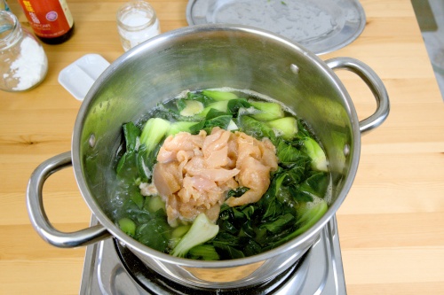 add the marinated meat slices to the soup