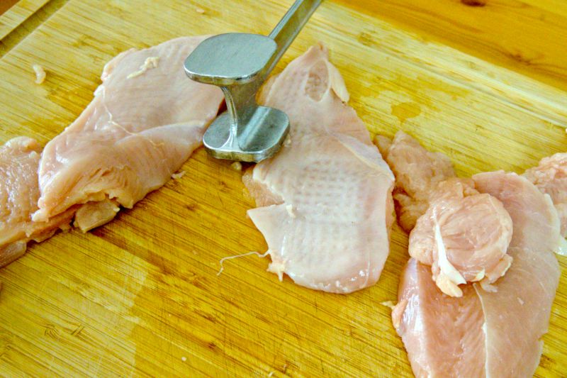 Use the meat mallet to pound the chicken., Parmesan Crusted Chicken