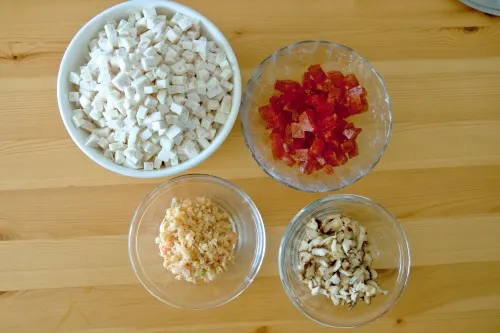 The main ingredients to prepare taro rice- Chinese sausage, taro, mushrooms and dried shrimp