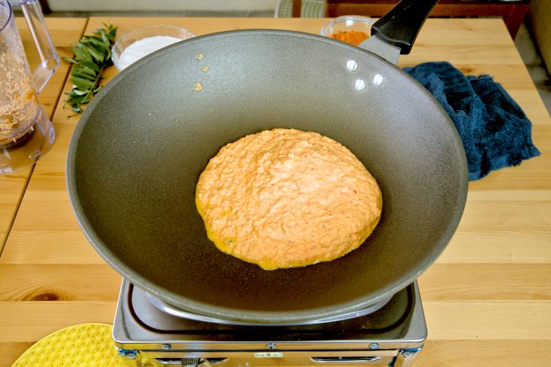 Saute the curry paste until it is dry and fragrant.