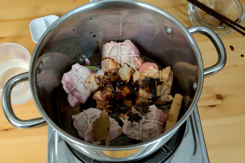 put all the ingrediens in the pot and start braising (braised pork belly)