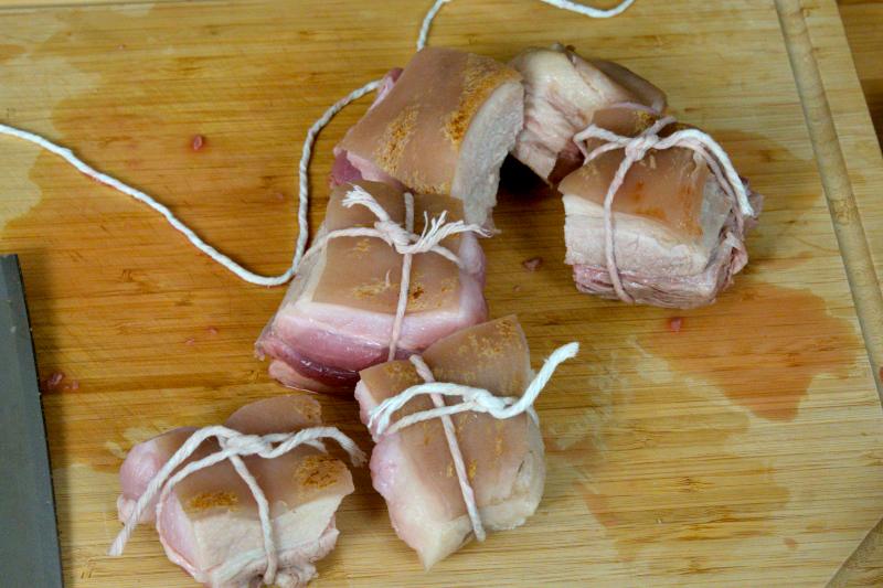 tie the pork pieces with butcher's string (braised pork belly)