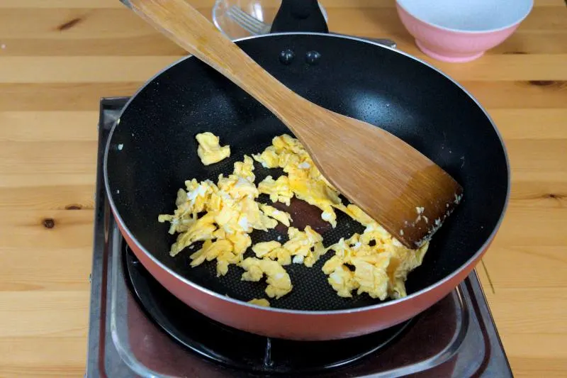 Beat two eggs and lightly scramble them
