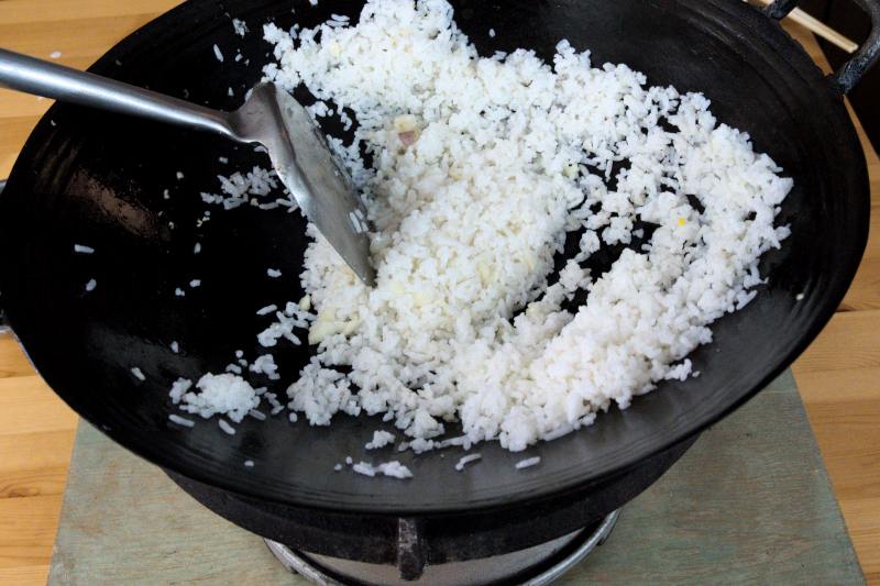 fry the rice over hight heat until fragrant