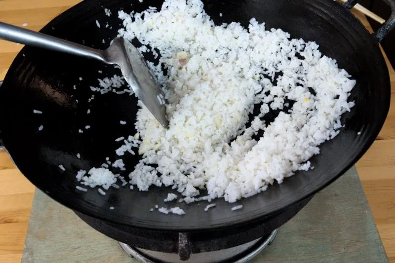 fry the rice over hight heat until fragrant