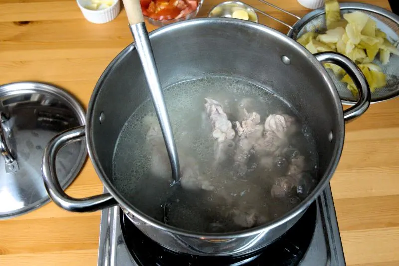 Simmer the pork ribs until tender to make the salted vegetable soup