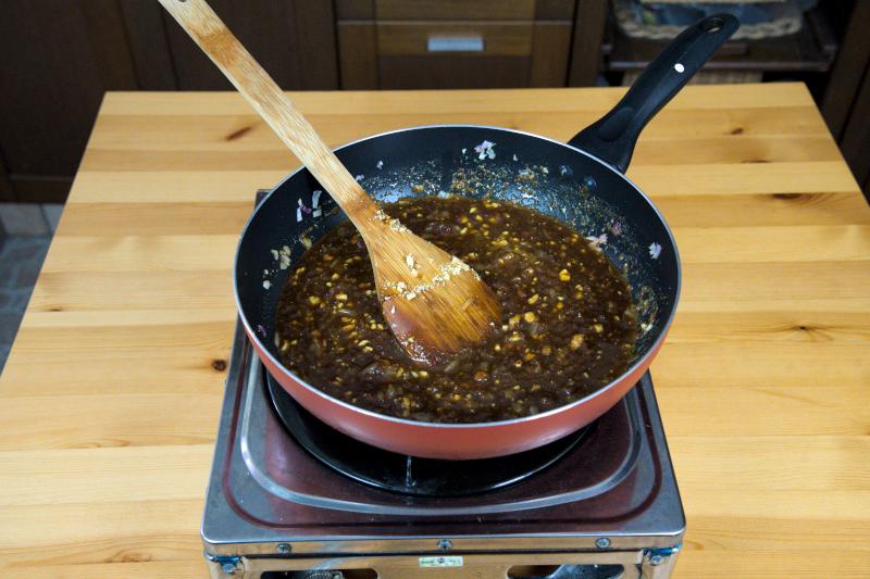 the sauce is made with mainly sacha sauce, satay sauce and peanuts..