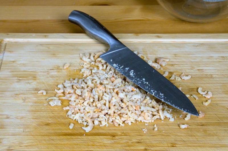cut the dried shrimp into smaller pieces