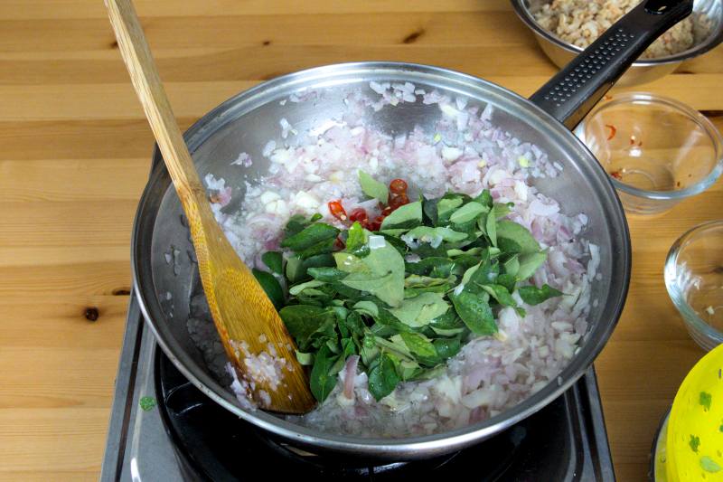 saute the aromatics and curry leave to make kam heong sauce