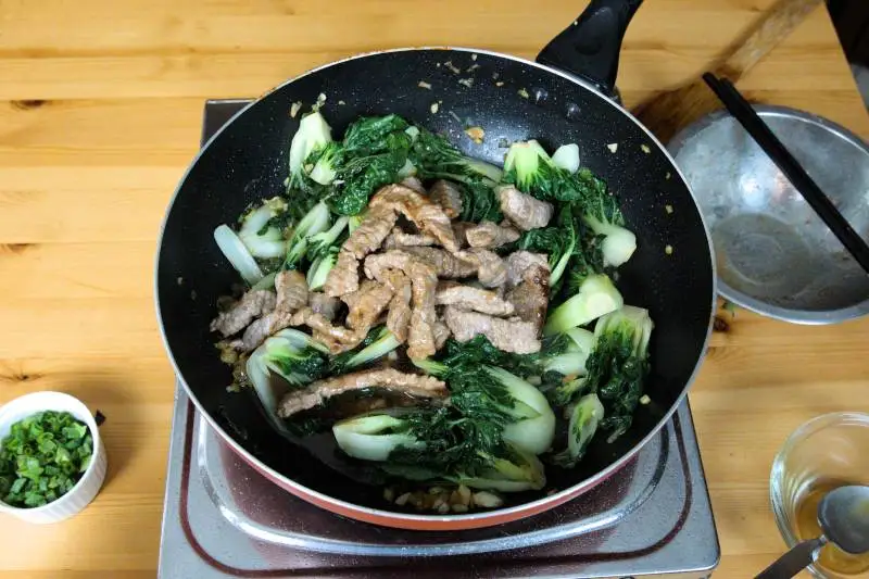 Combine the beef with the bok choy